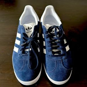 Blue and white Adidas Gazelles